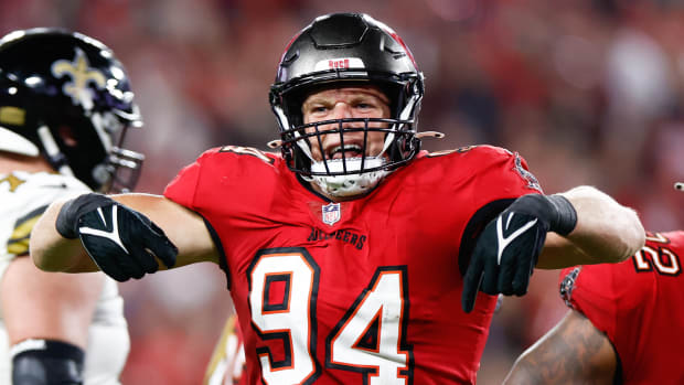 Dec 5, 2022; Tampa, Florida, USA; Tampa Bay Buccaneers linebacker Carl Nassib (94) reacts after sacking New Orleans Saints quarterback Andy Dalton (14) during the fourth quarter at Raymond James Stadium.
